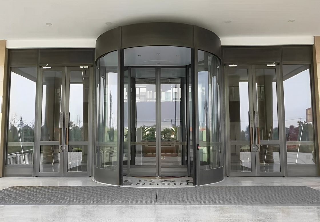 Fabbricante Porta girevole completamente automatica a vetro a autoinduzione per hotel Edificio commerciale